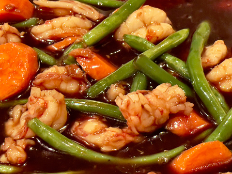 Teriyaki Shrimp with beans, carrots background