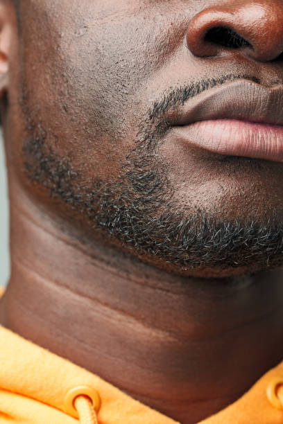 istock Close-Up of African Mans Lower Face and Lips 2094234899
