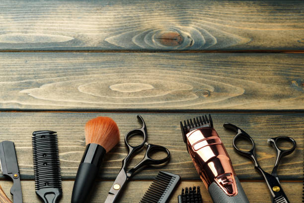 istock Set of professional barber tools on wooden table 2094234900