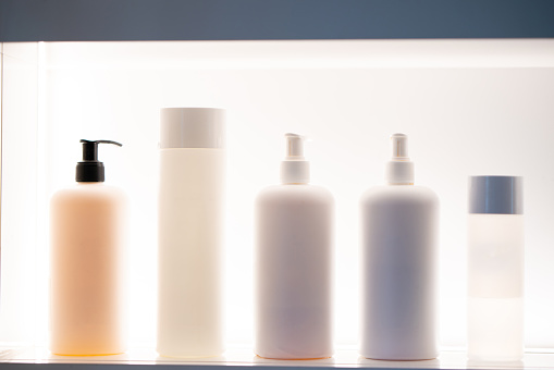 Facial care products on a shelf in a beauty salon