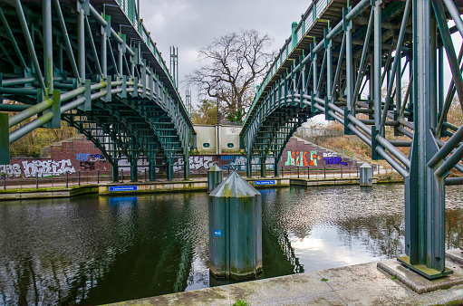 Berlin, Germany, March 6, 2024: a double steel bridge for pedestrians conecting two parts of Tiergaten park and the Zoo
