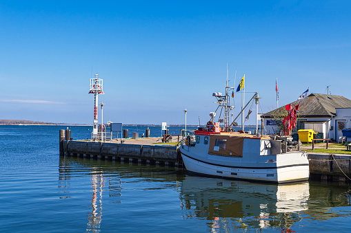 Orleans, Massachusetts, USA -May 26, 2021- The dock at Rock Harbor in Orleans is home to several sport fishing boats which are available for fishing expeditions in Cape Cod bay