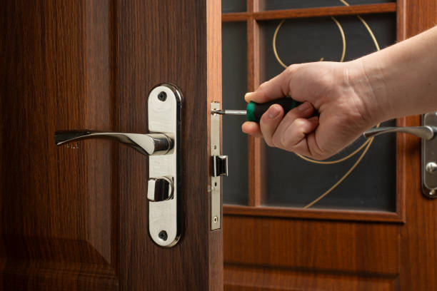 istock Locksmith repair or install the door lock in house. 2094325328