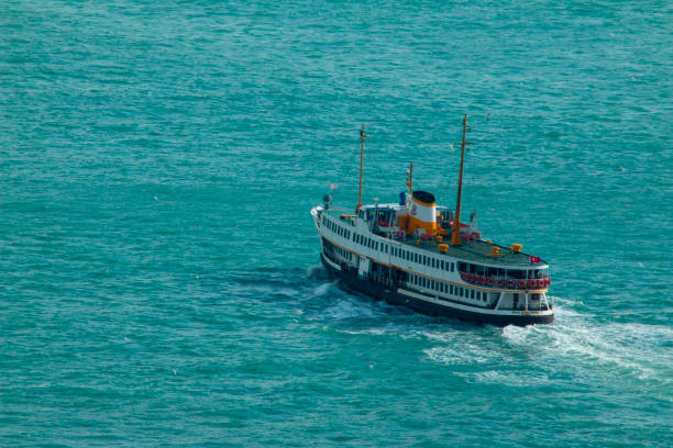 A tourist boat transports passengers to nearby islands in the Ionian Sea