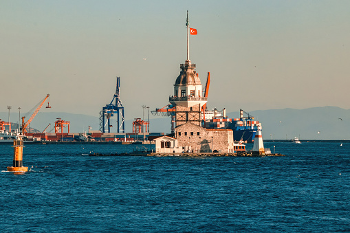 There is a shipyard in the background of the Maiden's Tower. Kiz Kulesi, Istanbul