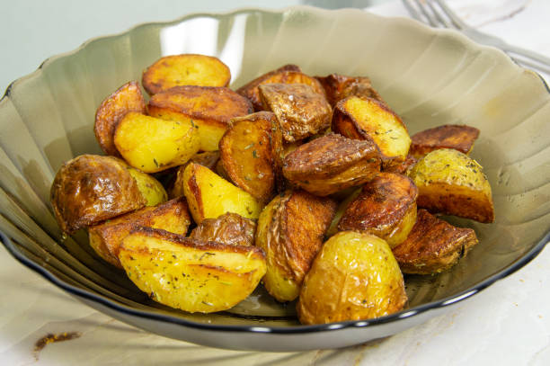 istock A glass bowl of fried potatoes 2094432622