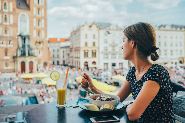 istock Tourist visiting Krakow is eating lunch in restaurant 2094433663