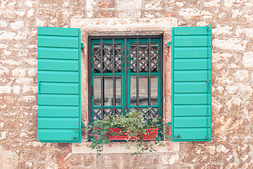 Old window in Mediterranean architecture.