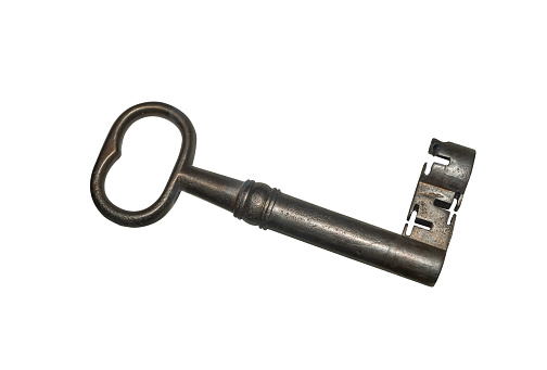 Antique iron key isolated on white background.