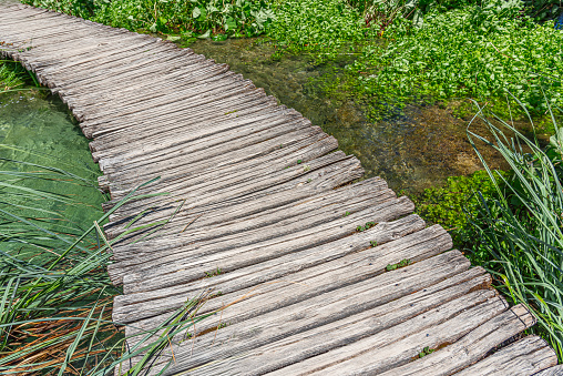 Wooden pier on a lake or river.