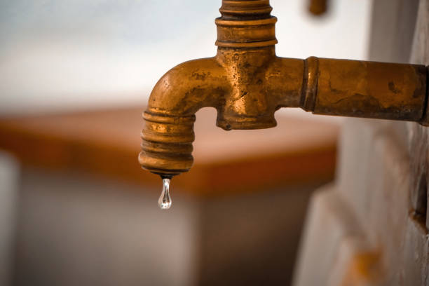 istock Turkish ottoman style taps. Water drips from golden old happiness. 2094462317