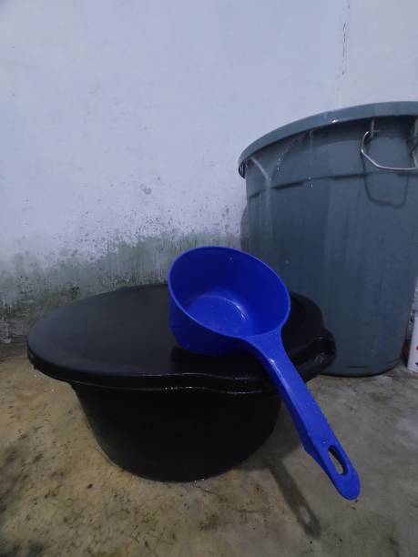 istock Plastick Dipper in the Well-Stock Photo 2094465521
