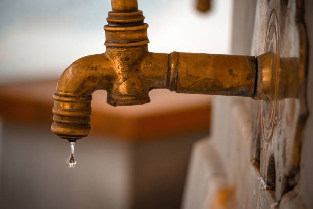 istock Turkish ottoman style taps. Water drips from golden old happiness. 2094466032