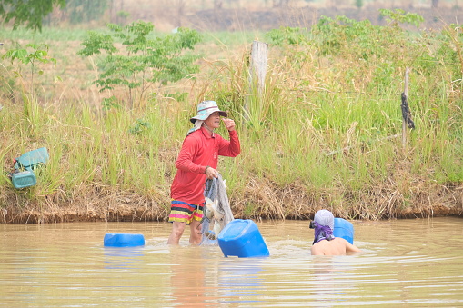 Roi-Et Province, Thailand - March 10: Photographs of the landscape and the way of life and fishing of villagers in the countryside.