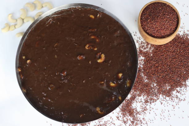istock Delectable Ragi Halwa in round steel plate mold 2094476134