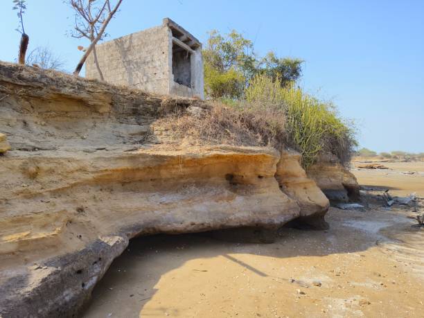 istock Clay cliff erosion bet dwarika beach, Gujarat 2094477691