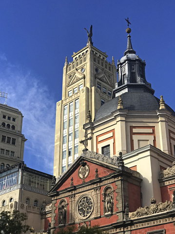 Skycraper and Church of Calatrabas in Alcala Street in the city of Madrid. Spain.