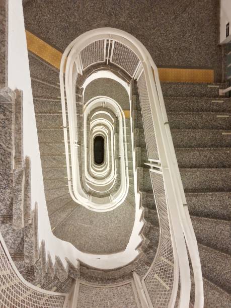 istock Spiral stairway photographed from the top floor 2094529187