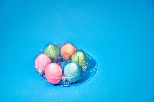 Colorful Easter Eggs in Plastic Packaging