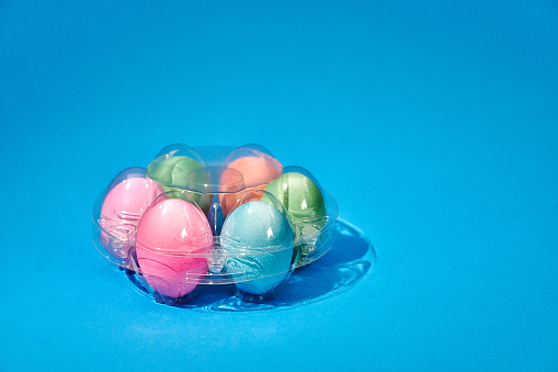 Colorful Easter Eggs in Plastic Packaging