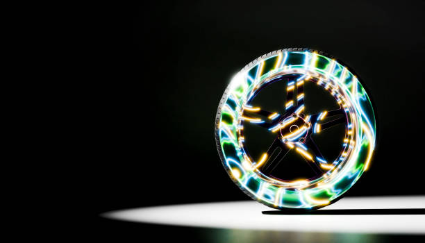 front view of a car wheel with bright rainbow color effects on a black background 3d render image
