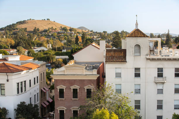 San Luis Obispo, California, USA - December 3, 2021: Aerial view of afternoon light shining on the historic buildings of the downtown core.