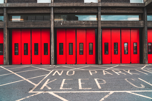 Entrance of fire station with gates closed in London