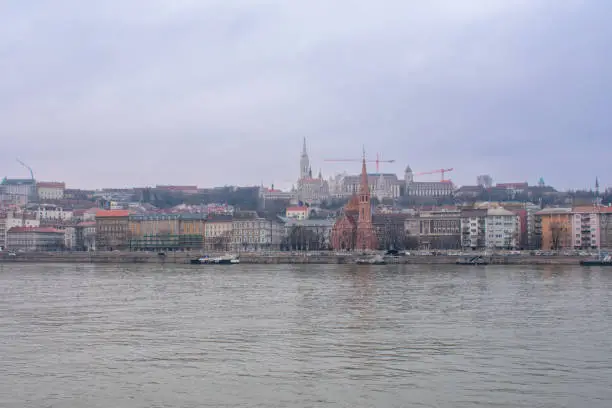 Photo of Budapest, Hungary. View over Danube River on Parliament Building, Buda Castle and Matthias Church.