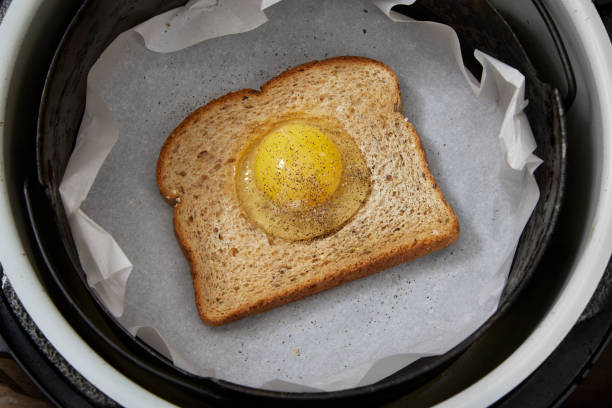 istock Preparing Air fryer Toad in The hole 2094632070