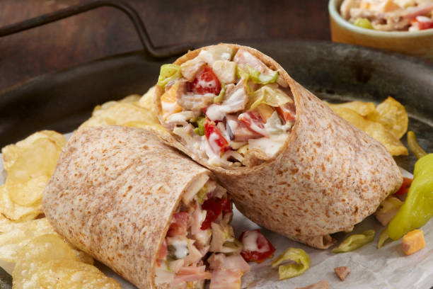 the viral chopped cold cut tortilla wrap - tray sandwich wrap sandwich delicatessen 뉴스 사진 이미지