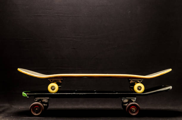 Vintage Style Black Skateboard on a black Background