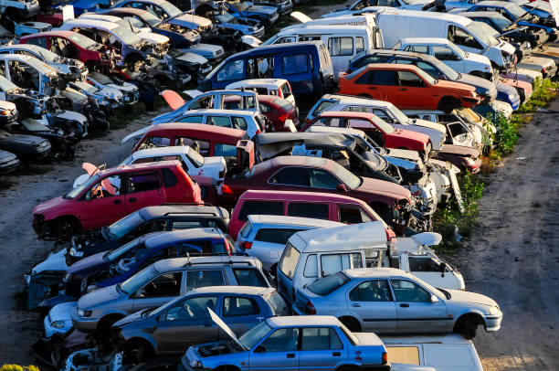 old junk cars on junkyard - metal recycling center ストックフォトと画像