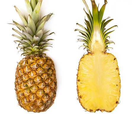 Pineapple background. Top view of pineapple halves
