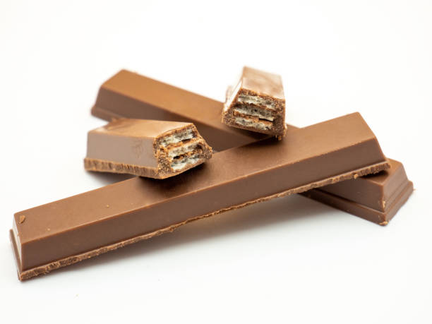 istock pile of delicious broken chocolate wafer on white background 2094751902