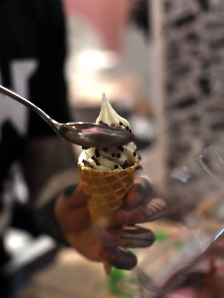 istock person serving chocolate ice cream 2094772515