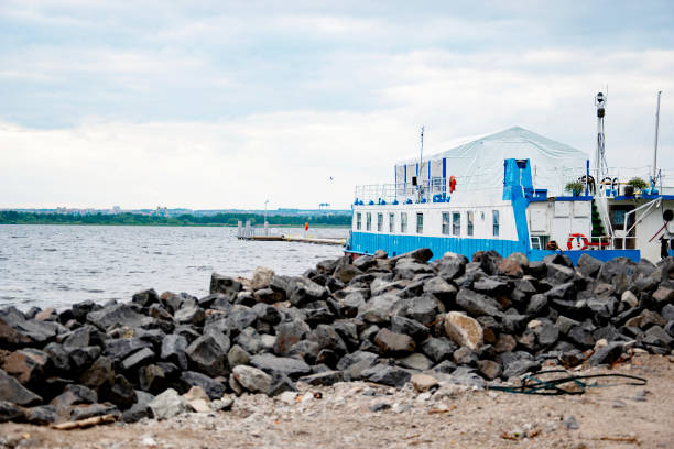 Yacht Port with stony beach and cloudy sky. This port is intended to service sailing and sailing-motor units.