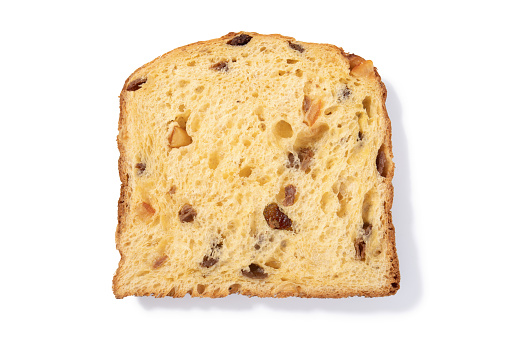 Indulge in the exquisite simplicity of a single classic panettone slice, capturing the essence of traditional Italian baking with its rich flavor and festive aroma, set against a clean white backdrop.