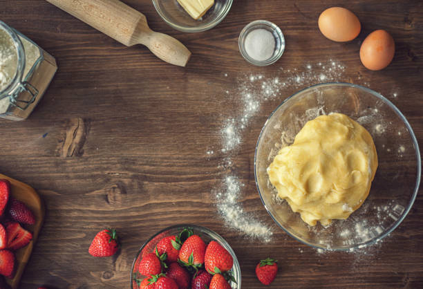 Preparing strawberry galette or open strawberry pie at home