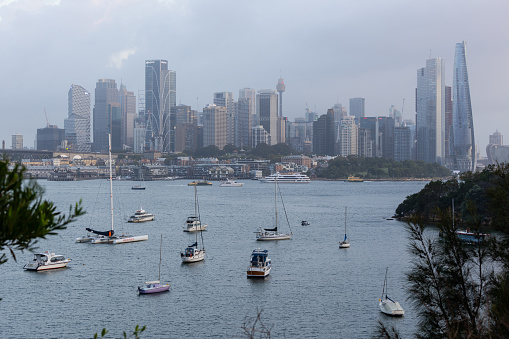 Sydney, Australia - March 7, 2024: Day view of Sydney Harbour skyline.