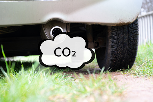 Exhaust of a car, CO2 emission, air pollution, global warming and climate change, reduce carbon footprint, environment protection, lifestyle