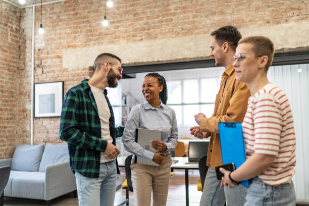 istock Young diverse colleagues having a casual business discussion 2094886189
