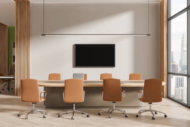 istock Cozy meeting interior with table and chairs, tv display and panoramic window 2094888350