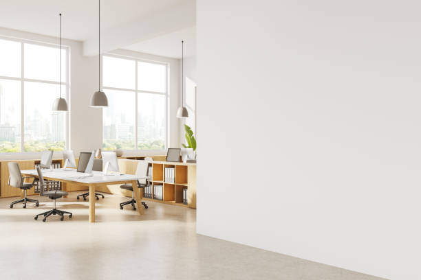 istock Modern white coworking office corner with blank wall 2094918275