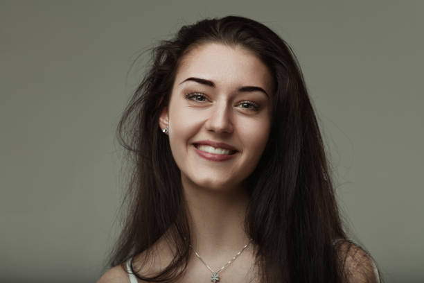 Her vibrant smile and sparkling eyes suggest playful charisma