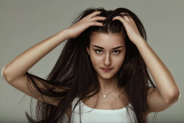 istock Tousling hair, her enigmatic eyes draw attention 2094928164