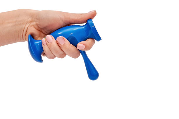 istock Trigger point massager in female hand on white background 2094949040
