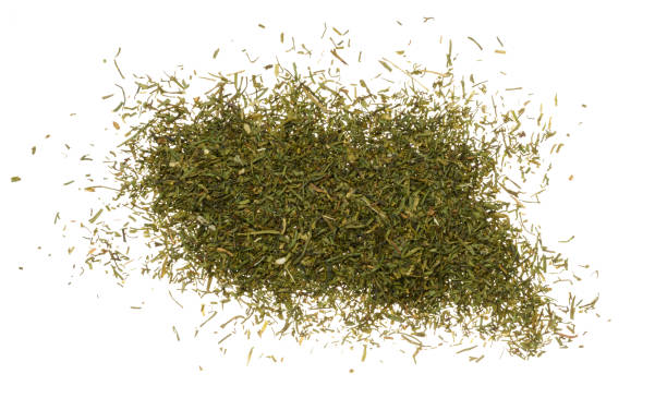 istock Dried dill scattered on isolated background, top view 2095012449