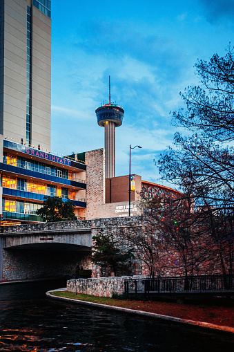 San Antonio, Texas, USA - Downtown Riverwalk and Grand Hyatt hotel, Tower of the Americas in background.