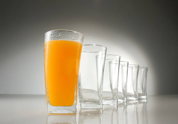 istock Glass cups with juice 2095060550