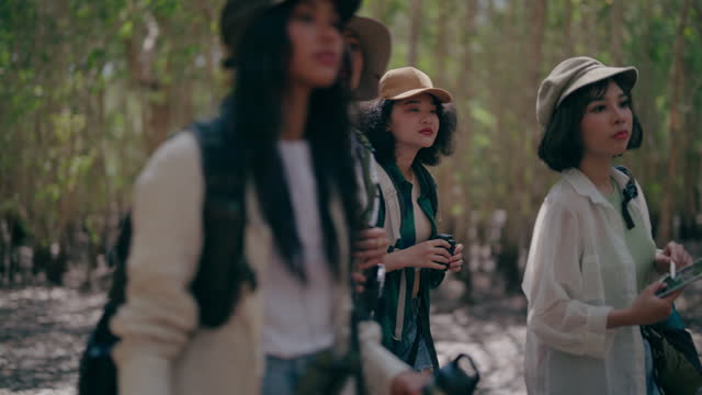 A bunch of young women out on a forest walk